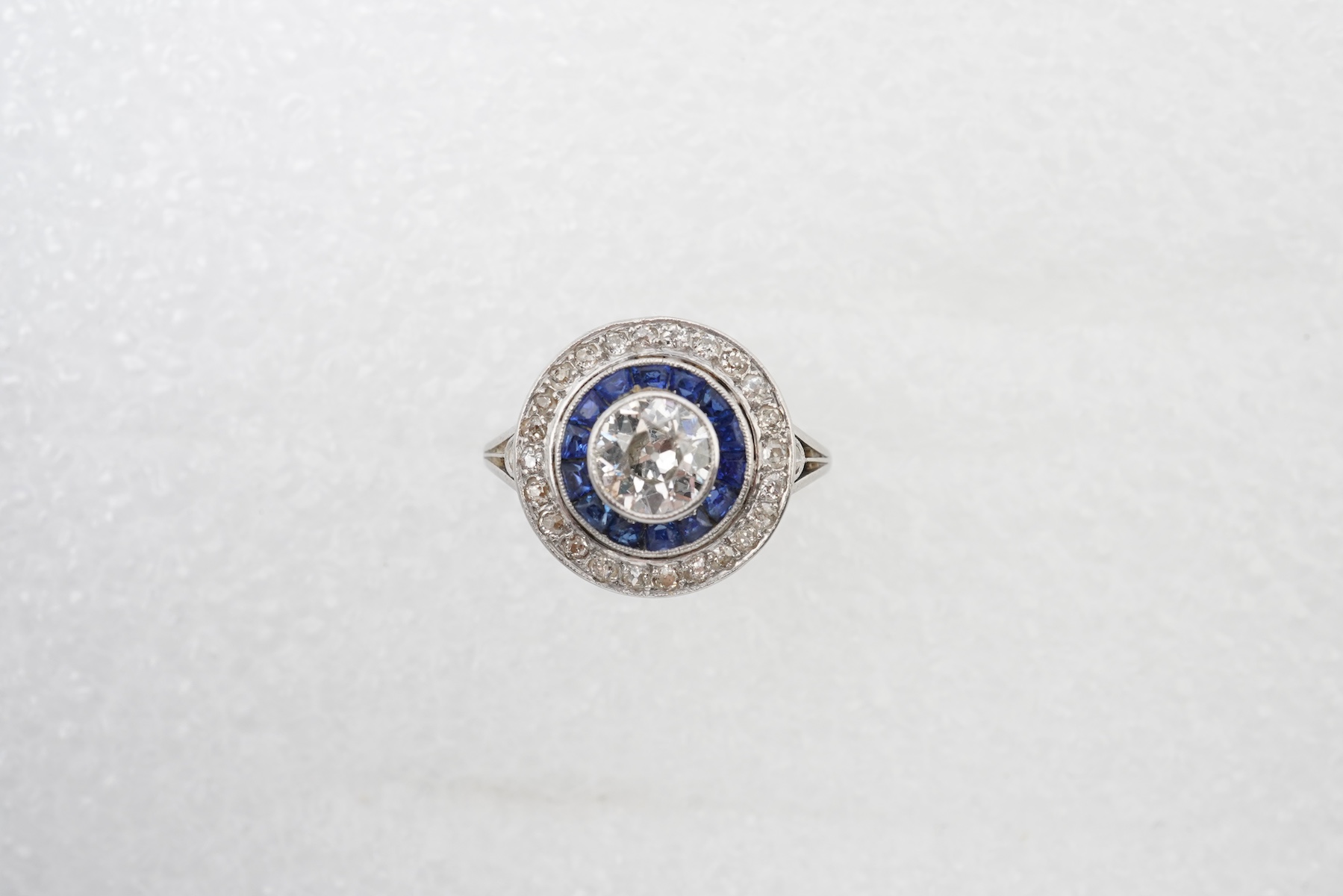 A diamond and sapphire 'target' ring